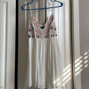 White flowy dress with floral print